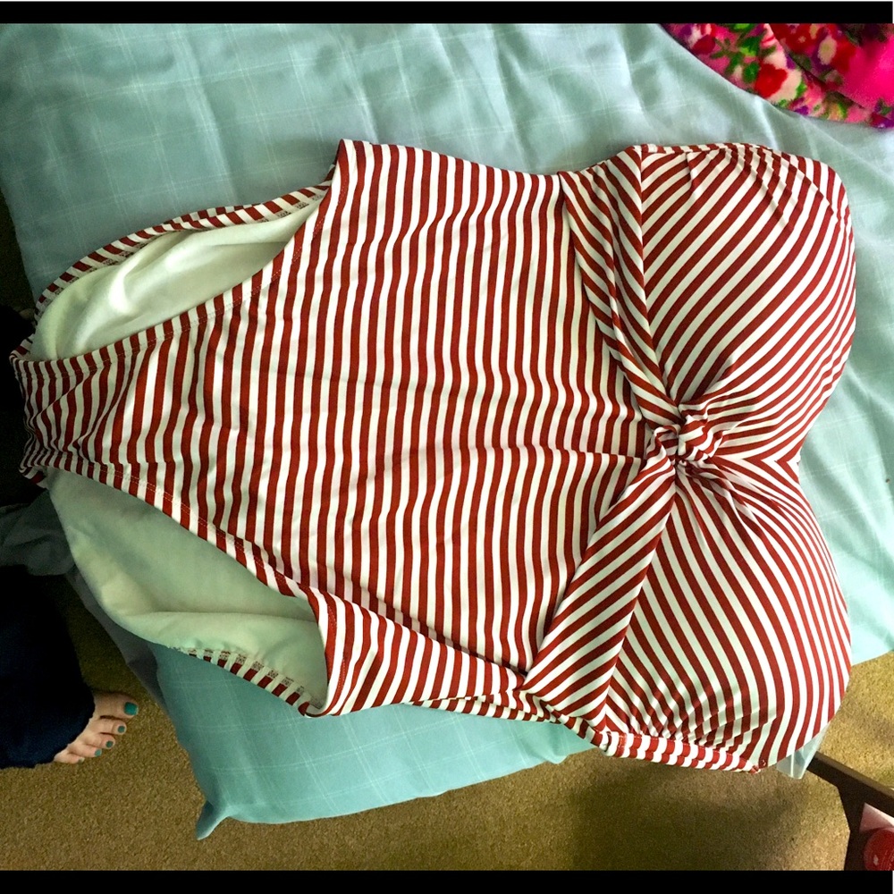 Red and white striped one piece bathing suit